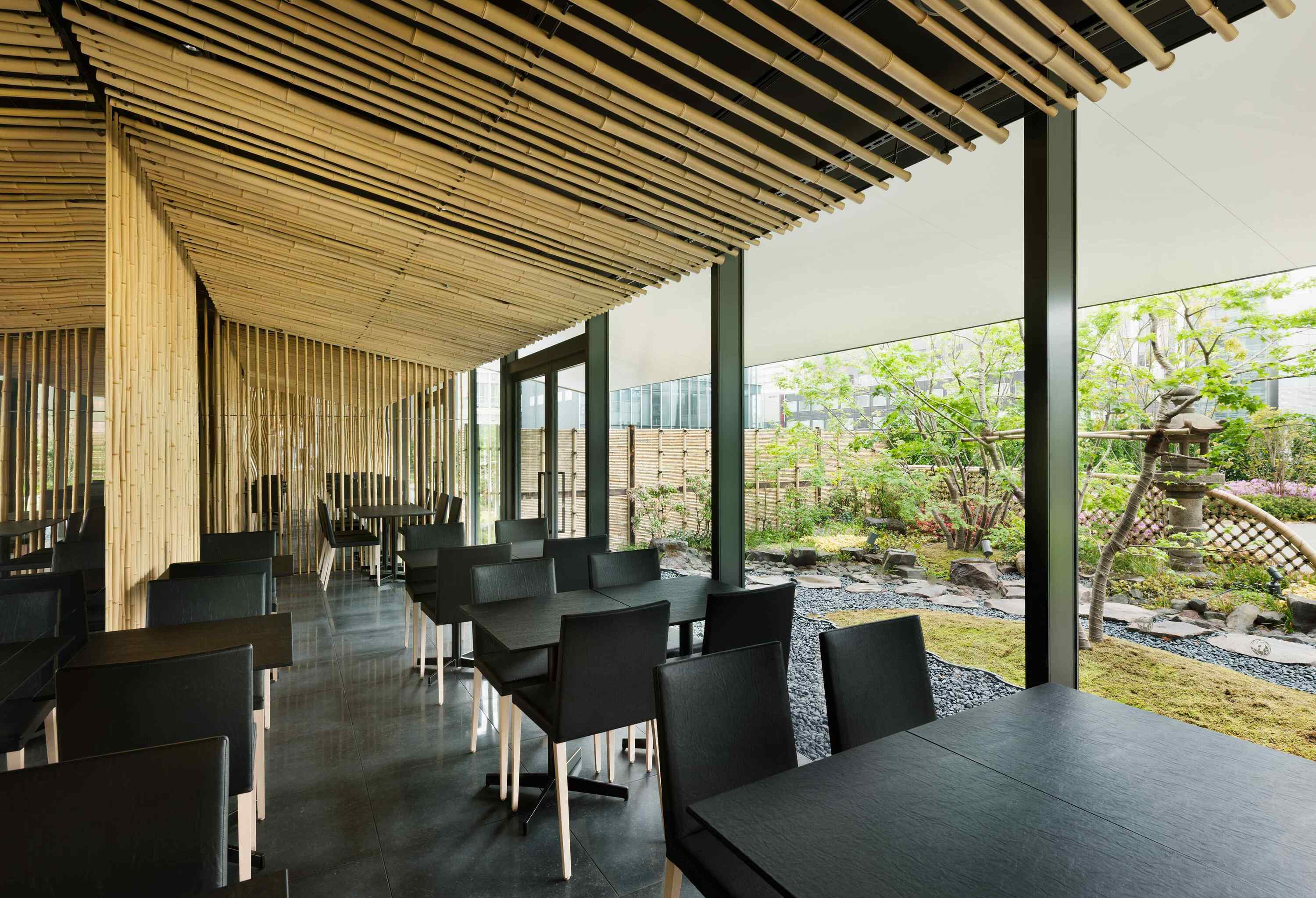 Jugetsudo Kabukiza dining room with layered bamboo ceiling and garden view through glass, Ginza