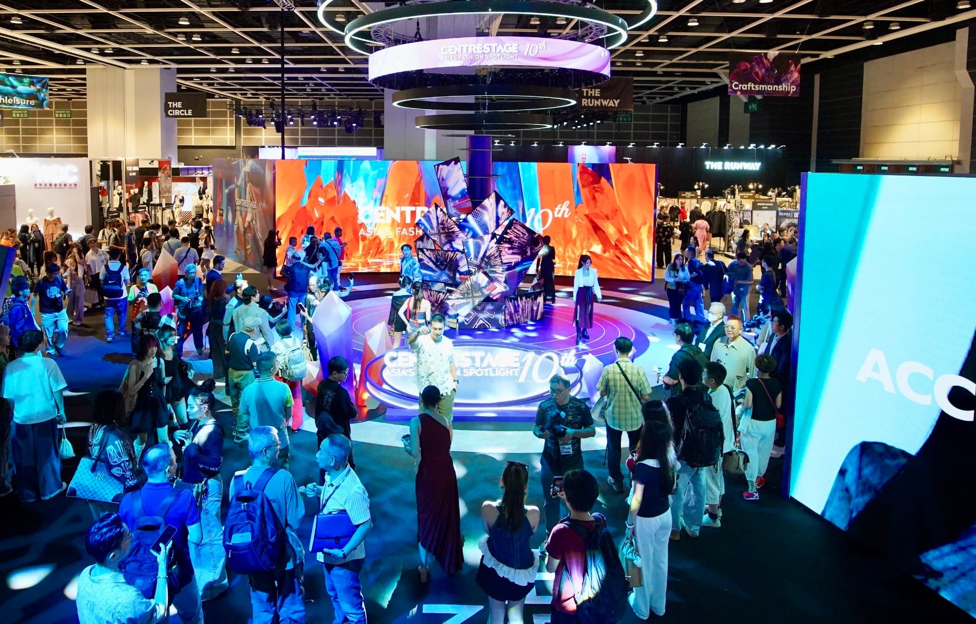 Wide view of CENTRESTAGE 2025 at HKCEC with circular LED stage reading CENTRESTAGE 10th Asia’s Fashion Spotlight