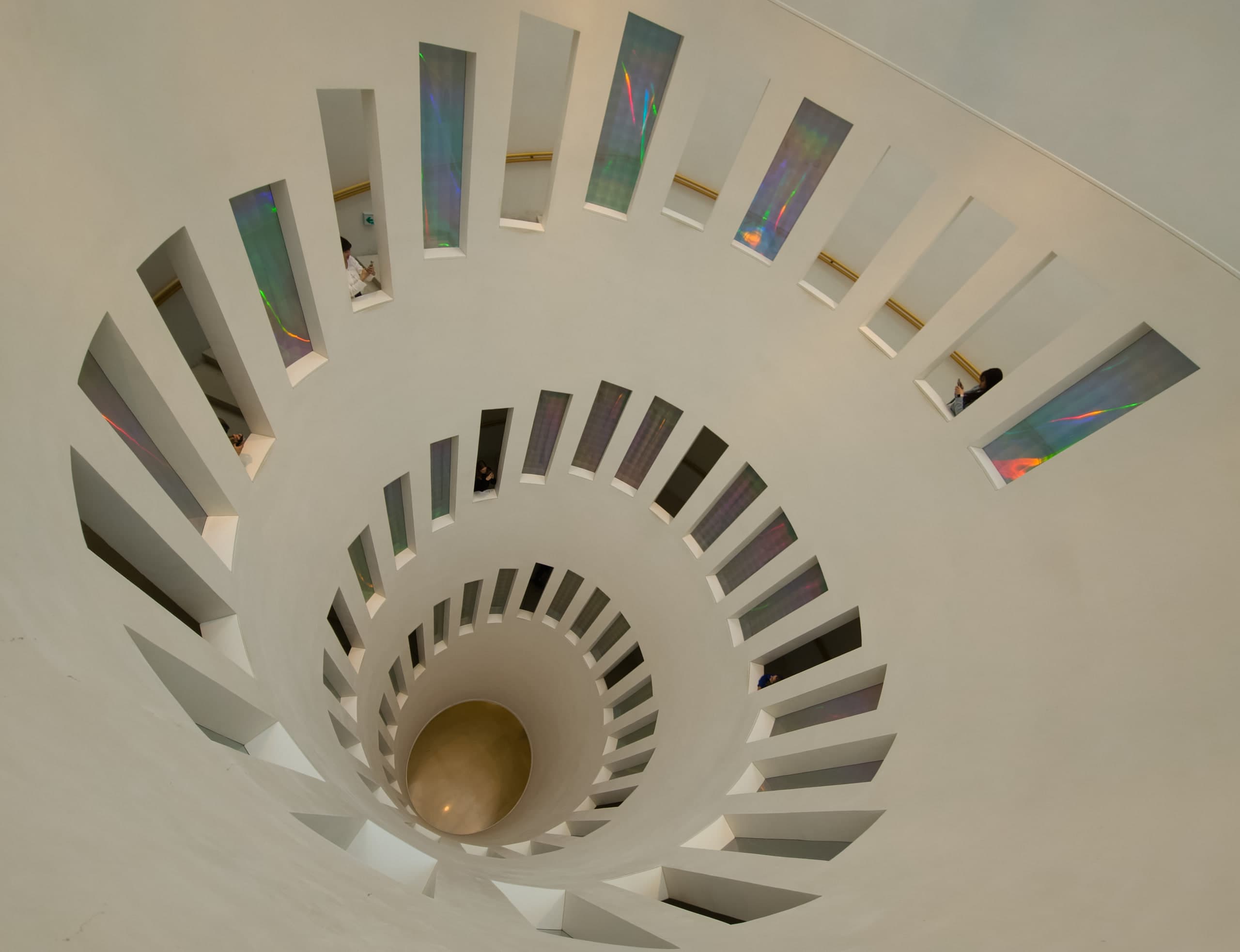 Looking down the spiral atrium at Leeum Museum of Art in Seoul, with iridescent glass panels