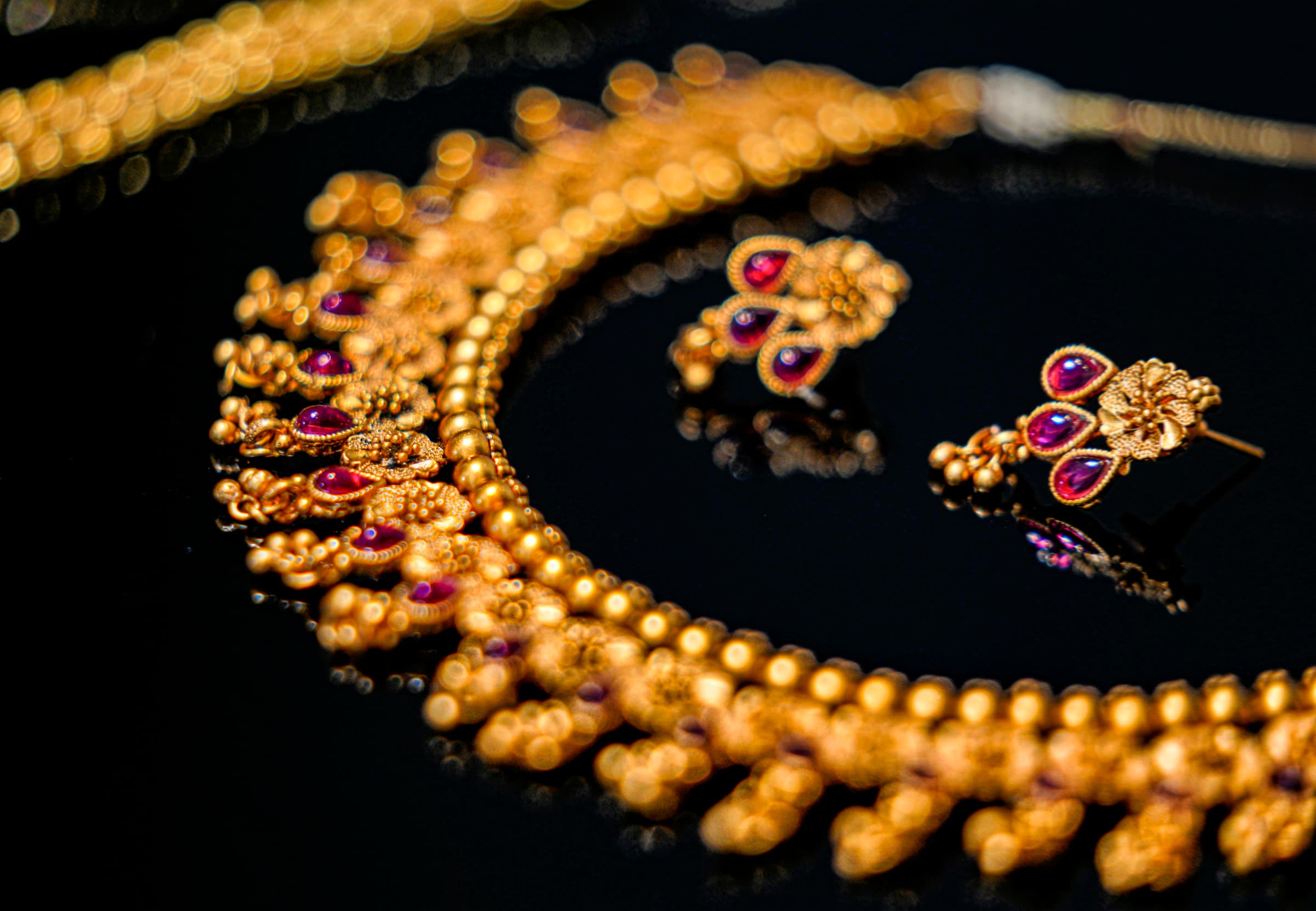 Faceted gemstones and precious stones on display