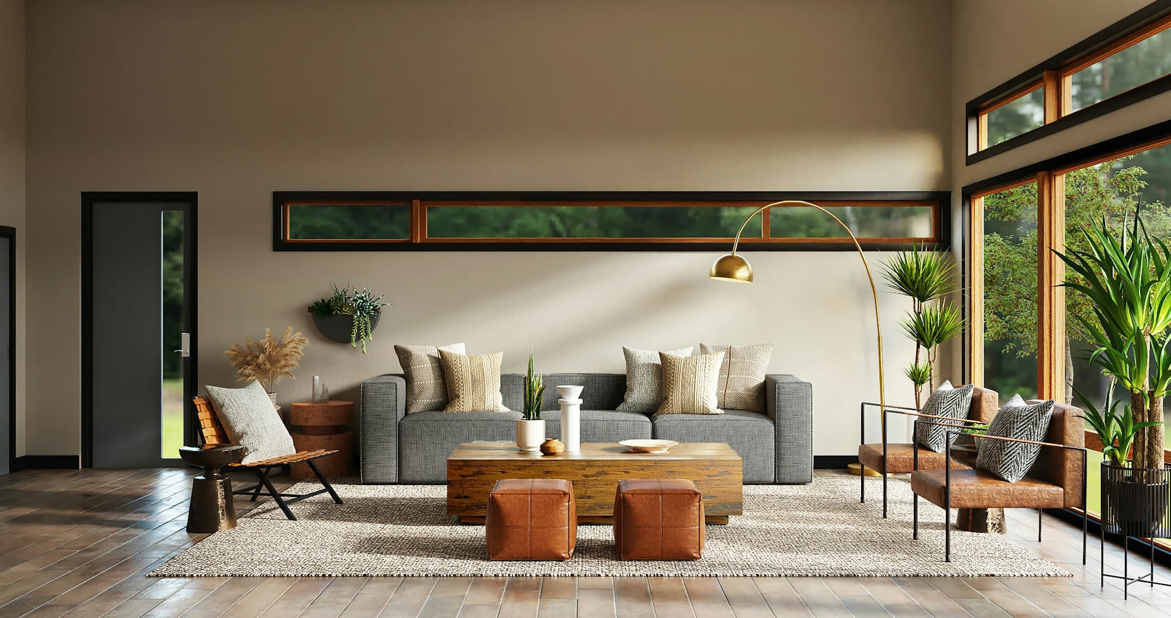Neutral living room with wood, leather chairs, and fabric sofa lit by large windows