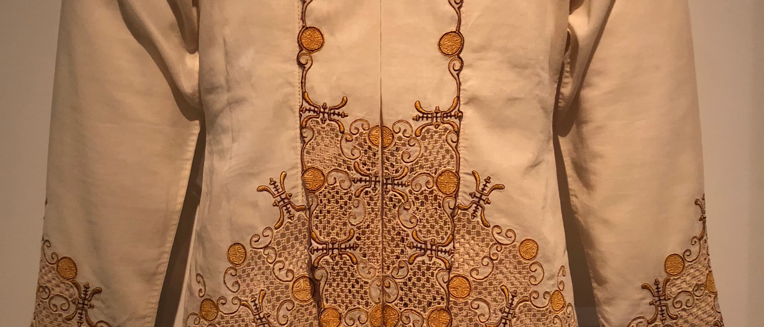 Ochre Peranakan kebaya from Malaya, circa 1950, in the collection of the Peranakan Museum, Singapore