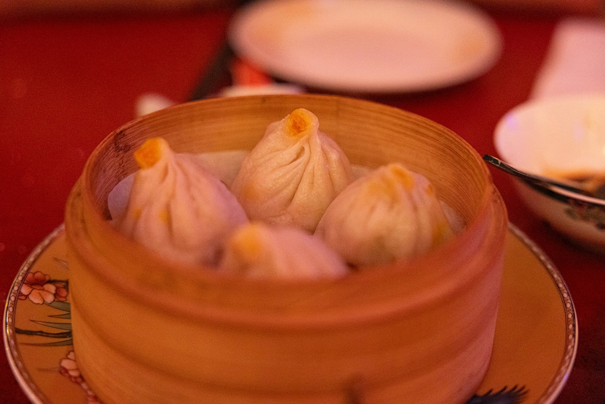 Soup dumplings in a bamboo steamer