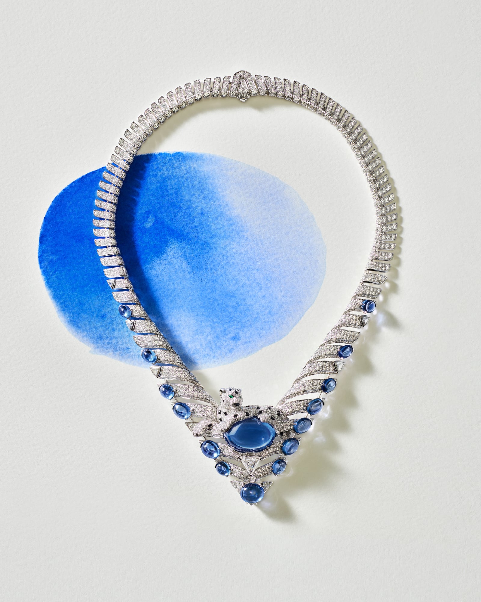 Cartier Panthère Kentia necklace with diamond panther on a large blue sapphire cabochon