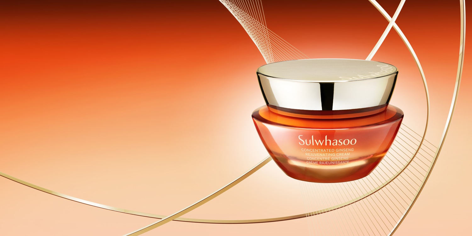 Amber jar of Sulwhasoo Concentrated Ginseng Rejuvenating Cream against a warm orange campaign backdrop