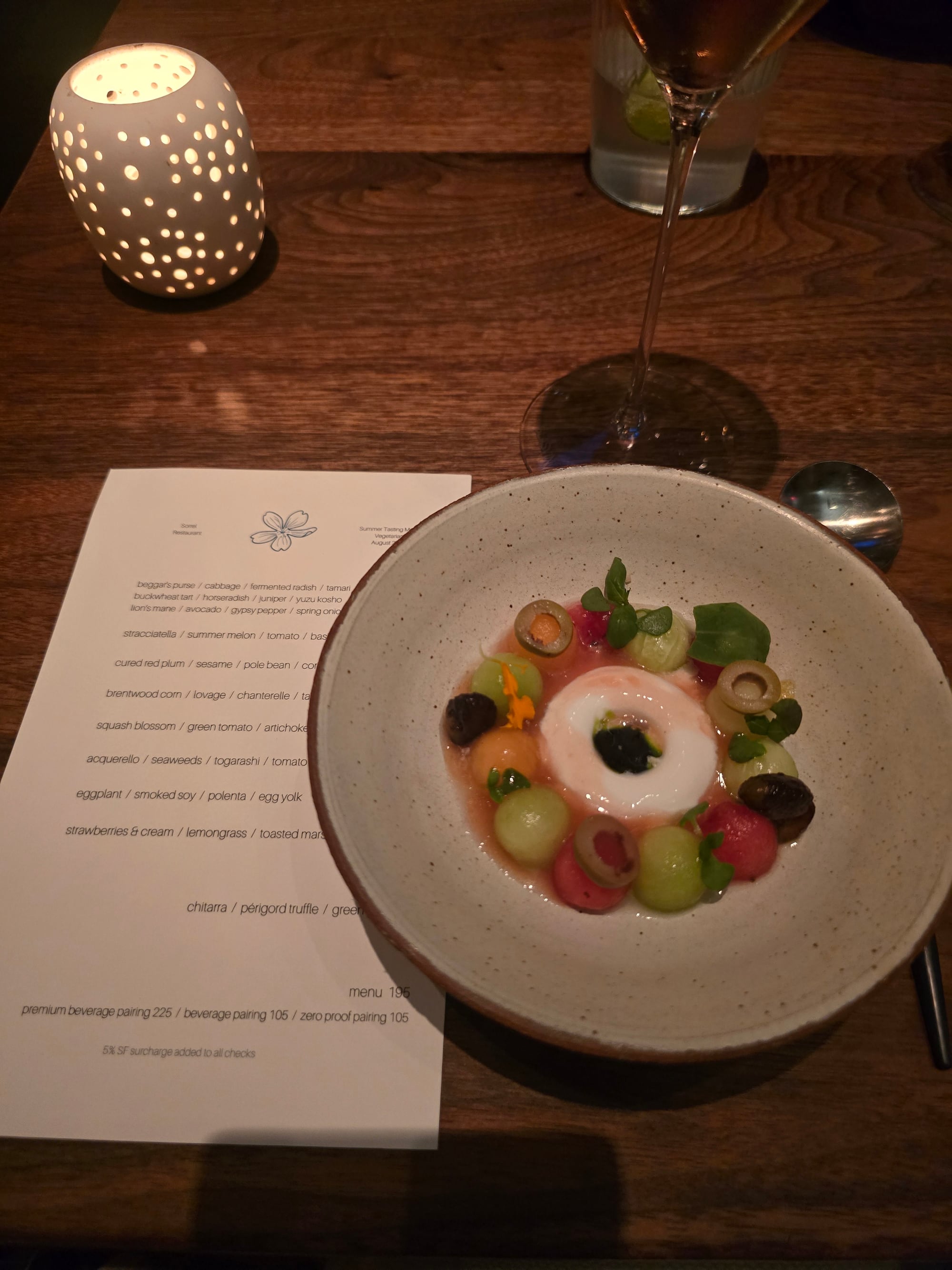 Stracciatella with summer melon, tomato and basil on the vegetarian tasting menu at Sorrel, San Francisco
