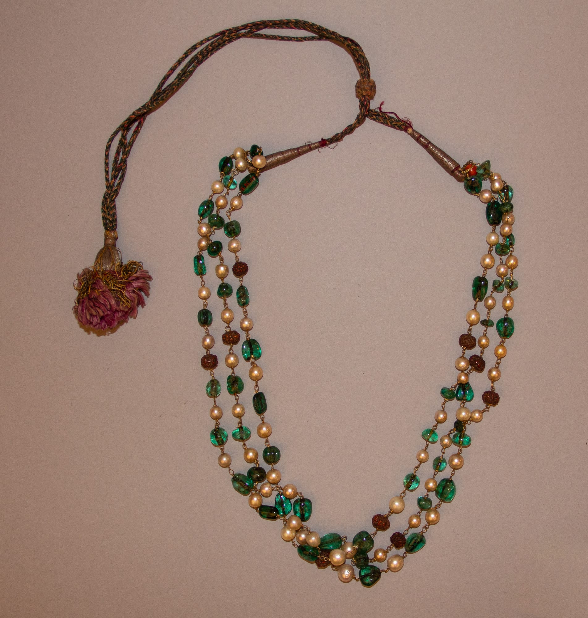 Indian gold necklace with pearls and emeralds
