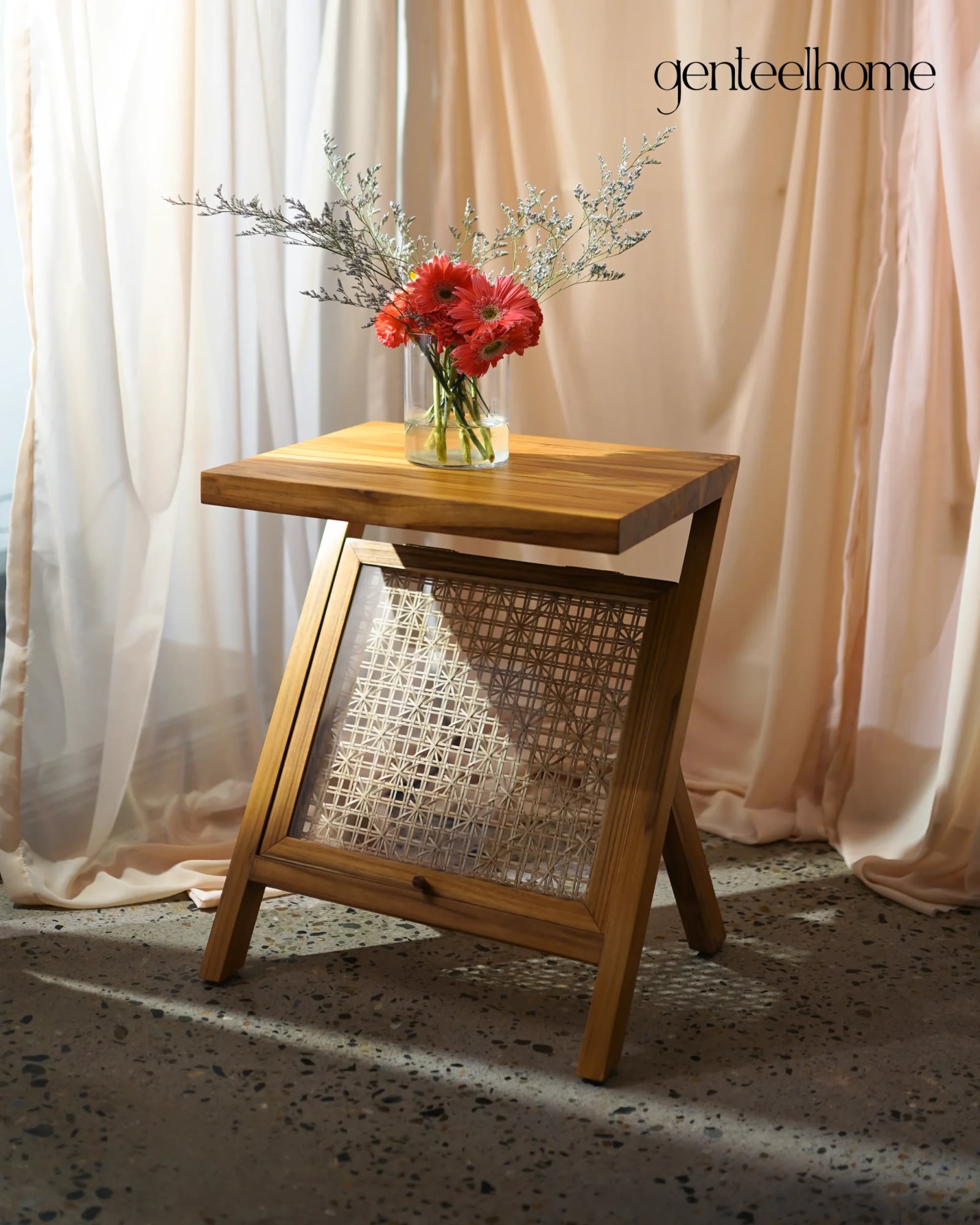 Balik Tanaw side table with framed solihiya weave and a vase of flowers