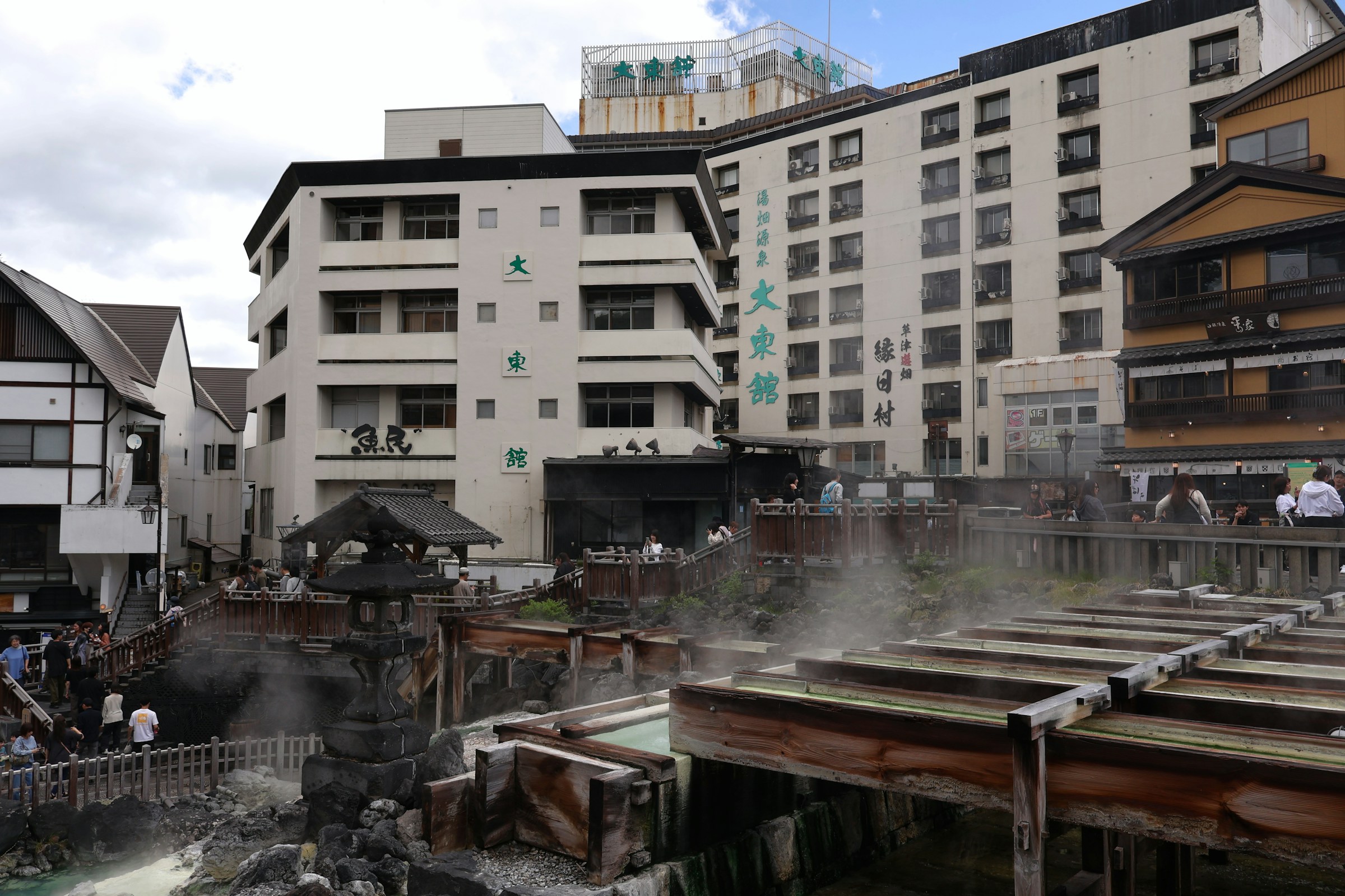Steam rising from the Yubatake hot water field at Kusatsu Onsen, Japan