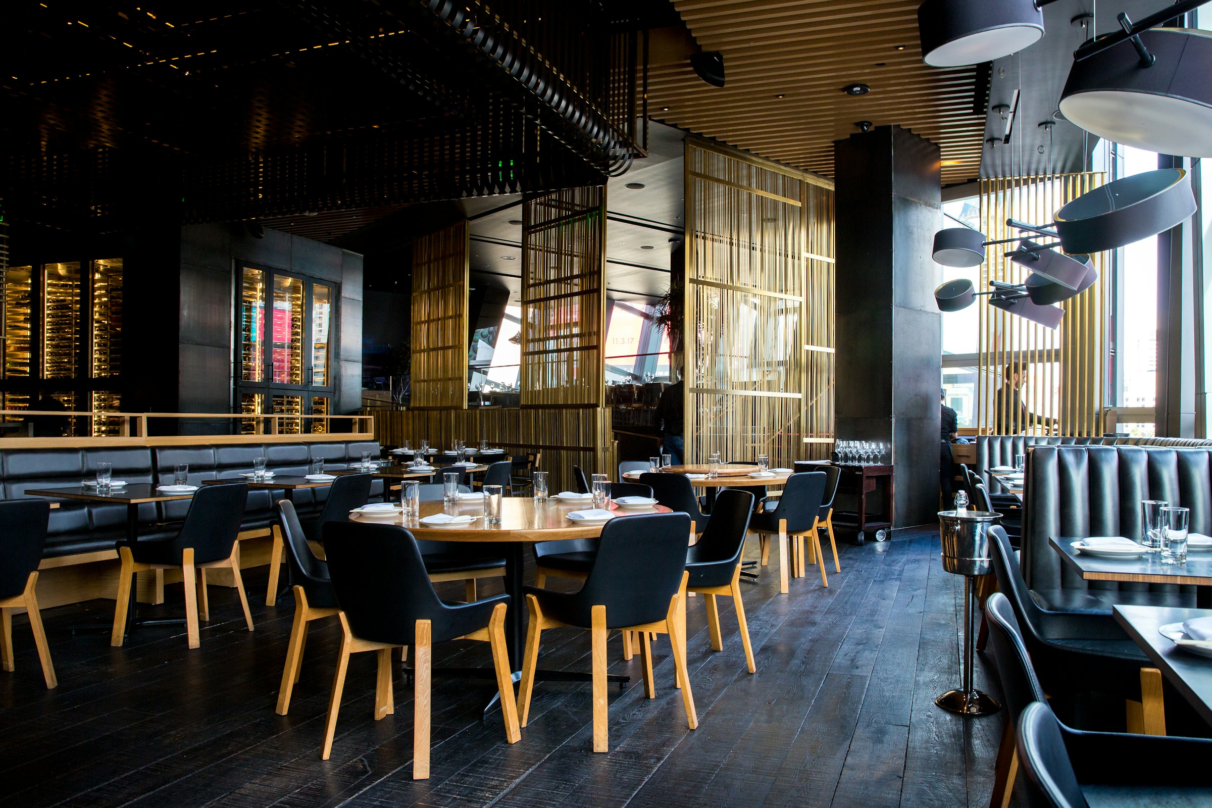 Walk-in wine cellar visible from a fine dining restaurant