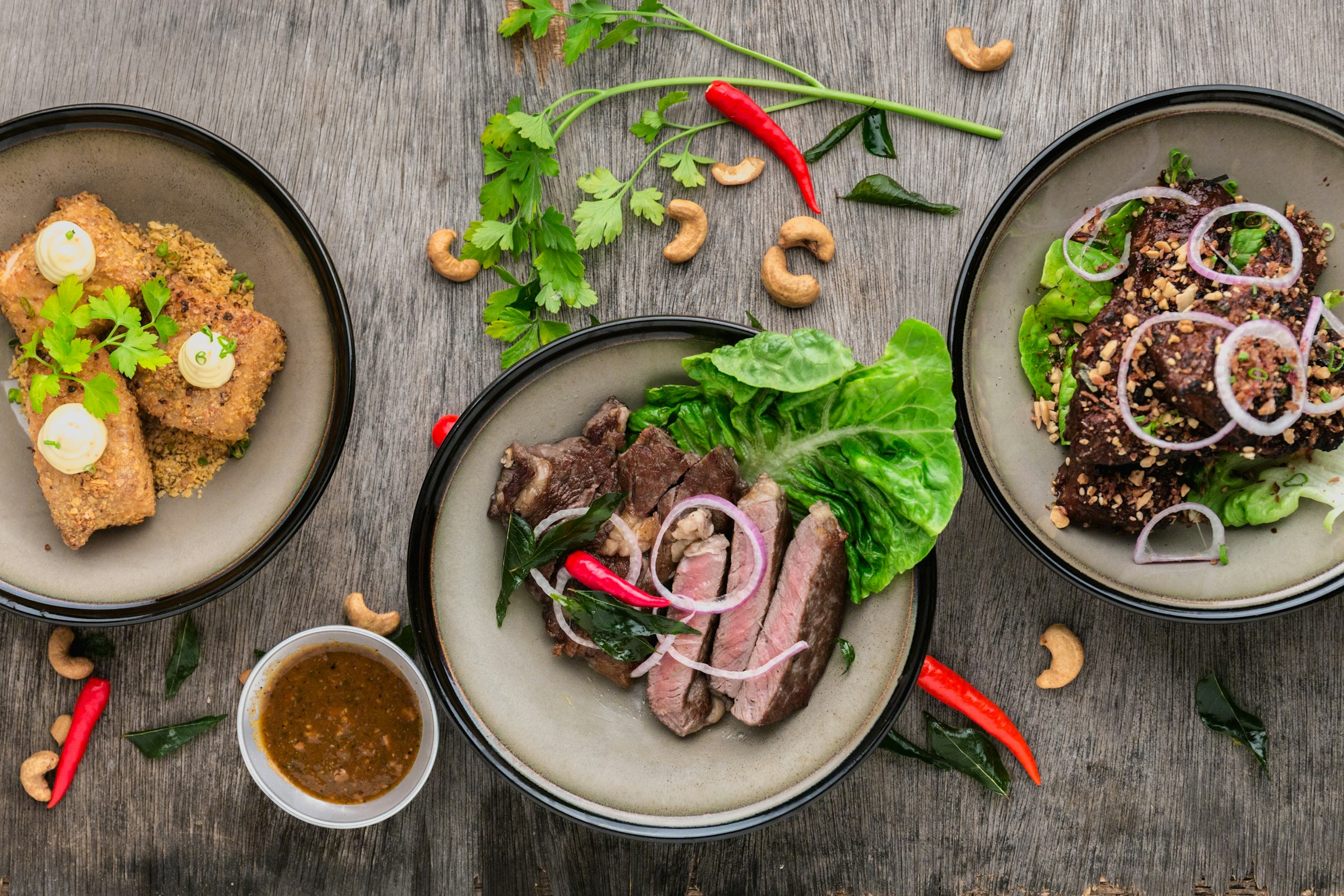 Contemporary Asian dishes arranged for a shared table